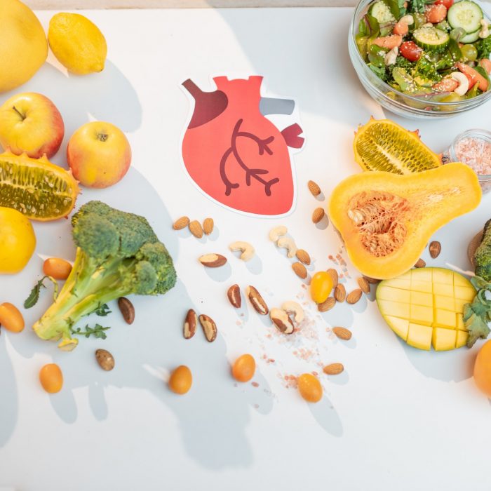 Human heart drawing and healthy fresh food on the table
